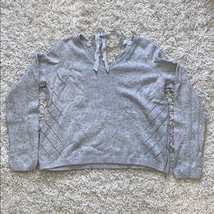 Sweater with bow on back